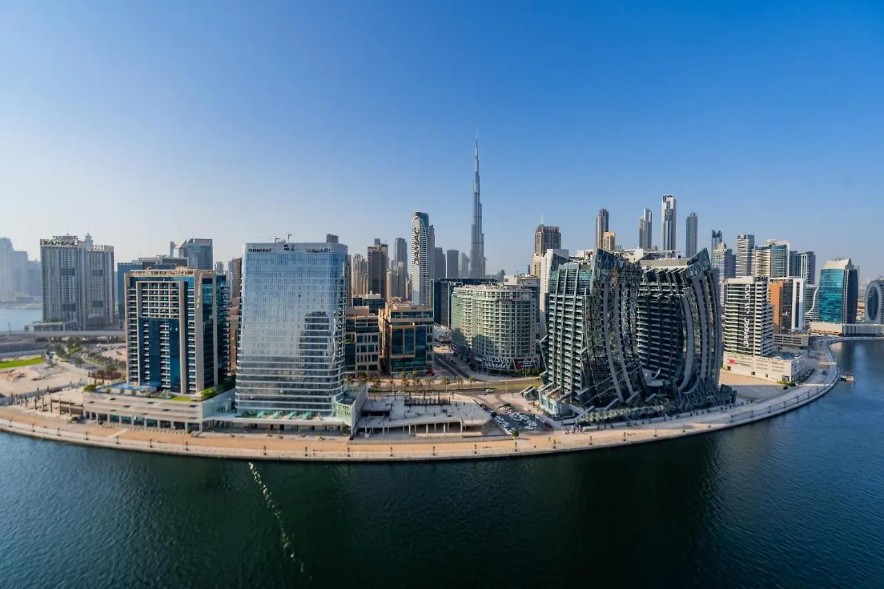 Апартаменты Kasco Homes Waves Tower Business Bay Дубай