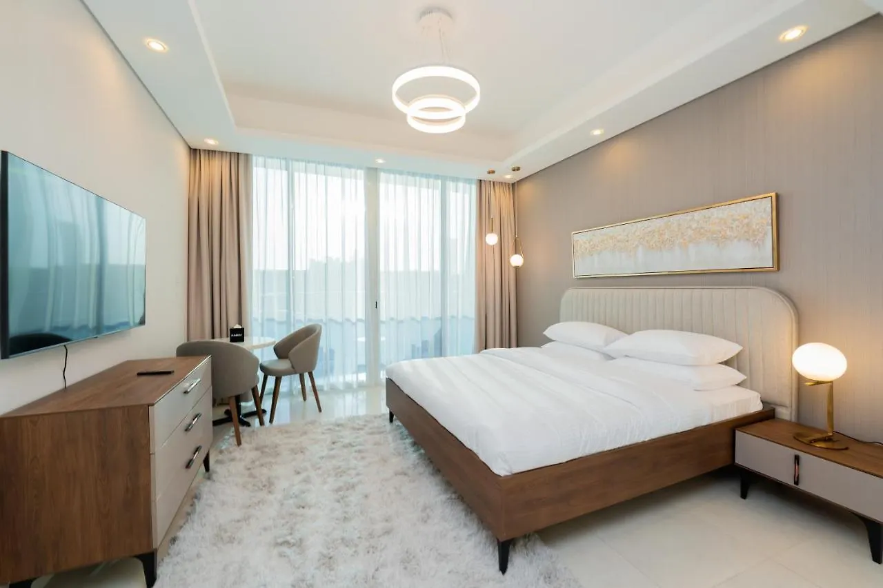 Апартаменты Kasco Homes Waves Tower Business Bay Дубай