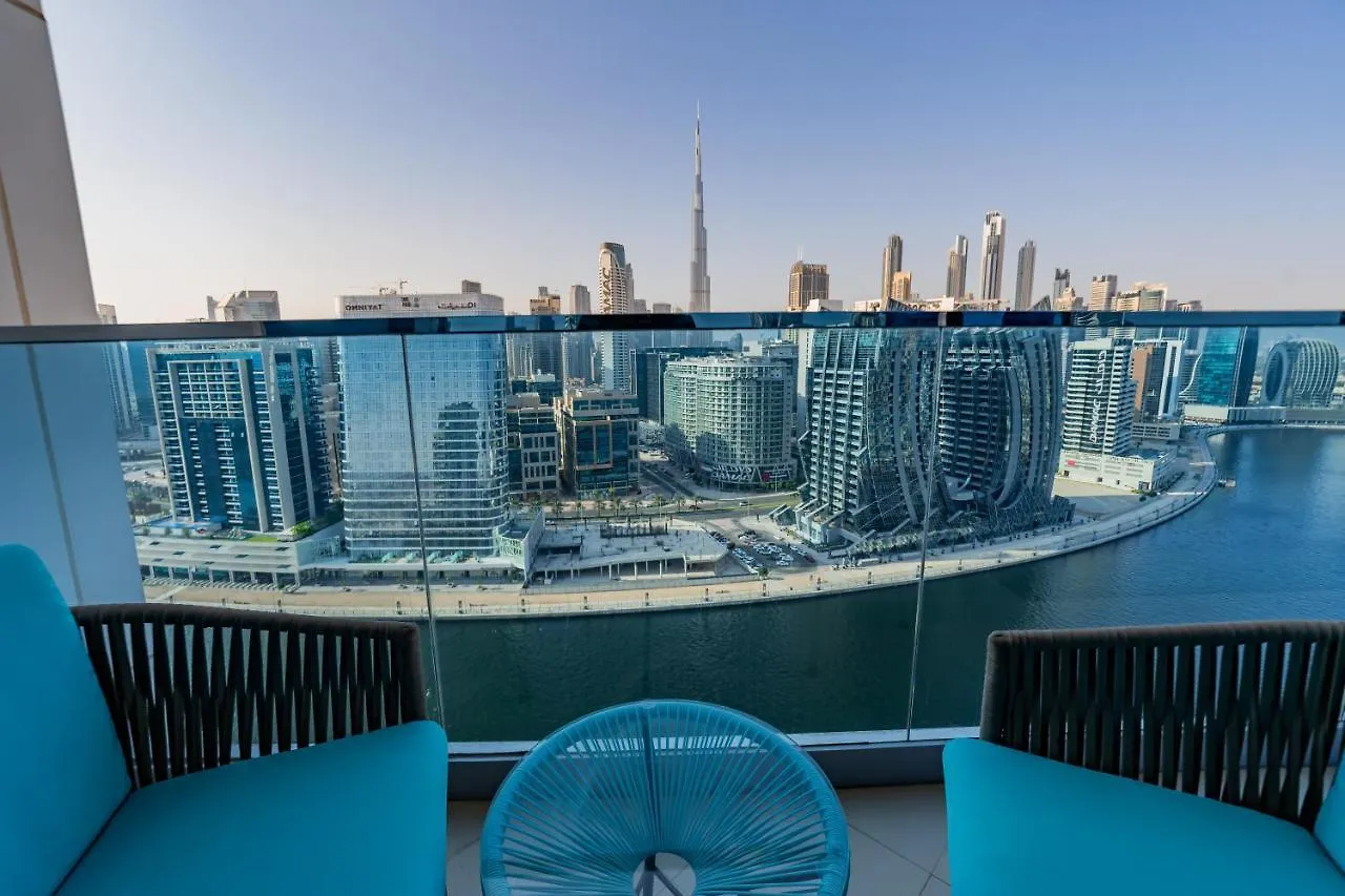 Апартаменты Kasco Homes Waves Tower Business Bay Дубай